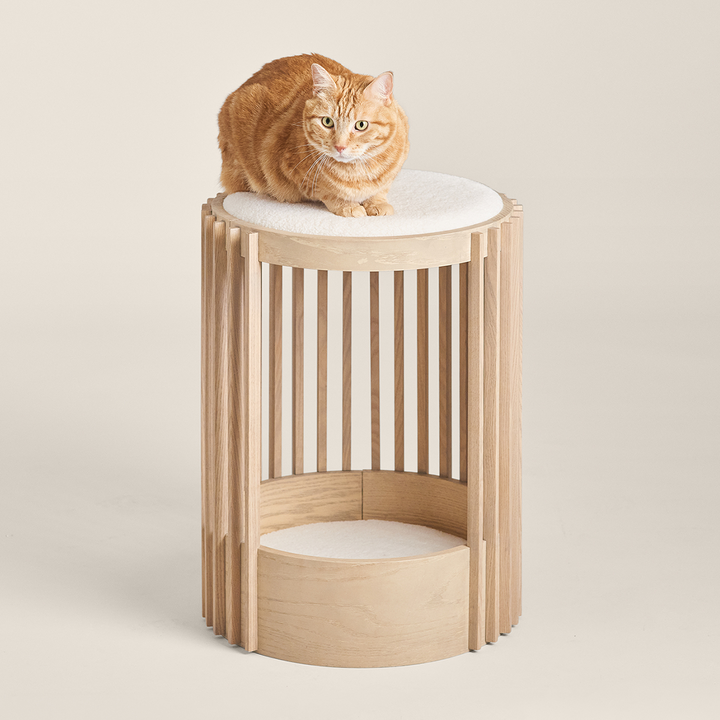 tuft + paw Grove Cat Tower with rounded slatted wood frame and two cushioned cat lounging levels