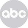 'ABC logo in a dark circle.'
